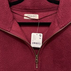 NWT Free People Coco Faux Sherpa Pullover. Dionysus Wine Color. Size Small